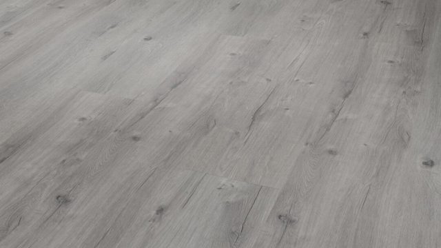 Tache de gras sur un parquet : comment la faire disparaître ?
